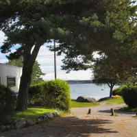 Solplassen & Rakke Camping AS